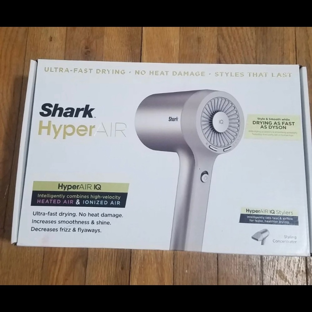 Shark hair dryer. Includes 2 attachments.